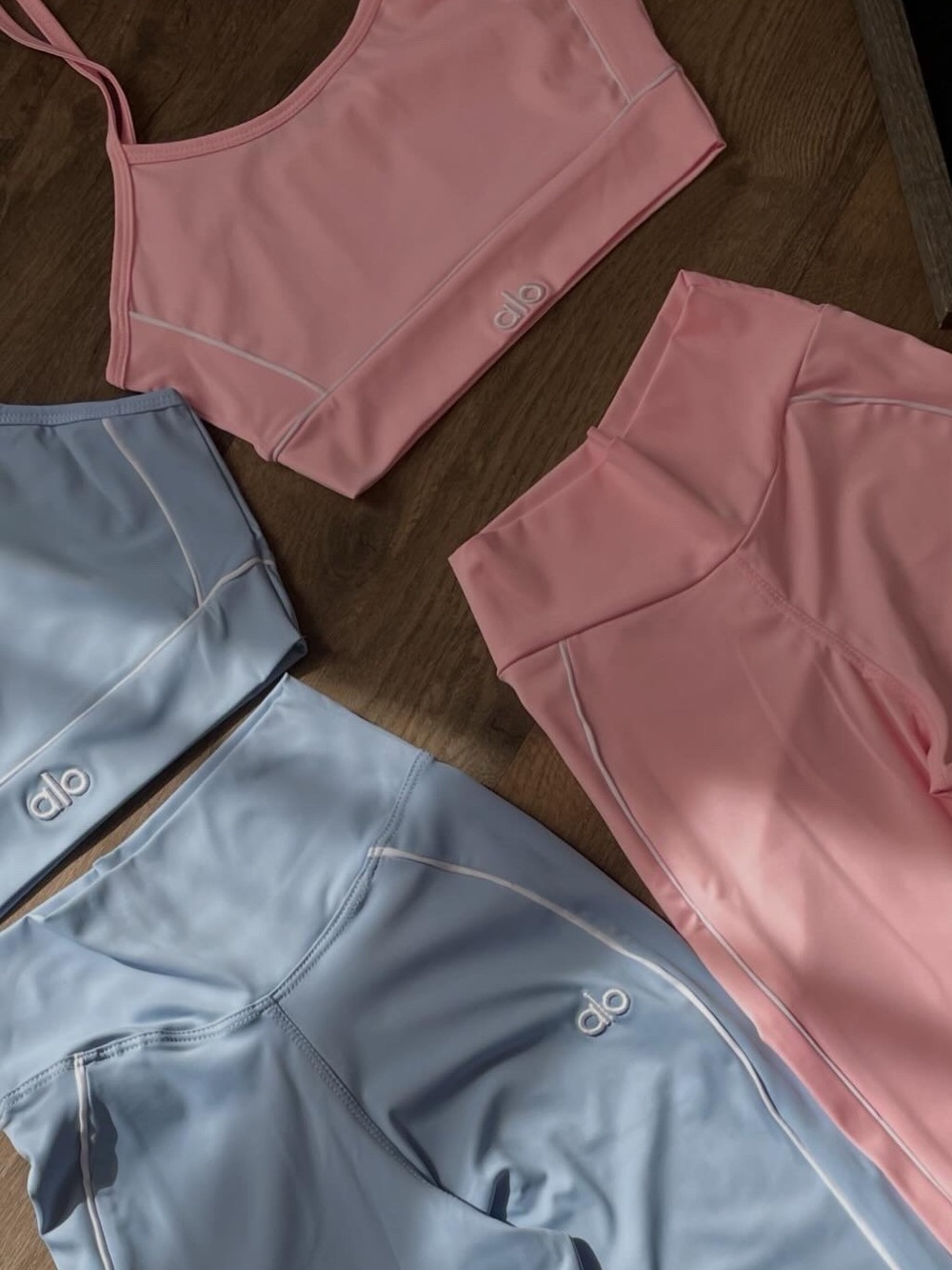 Both are for sale ALO Yoga Pastel Pink & Light Blue Matching Active Set